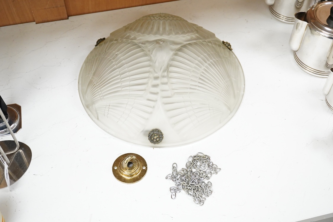 A Noverdy French pressed glass plafonniere of shell design, 34cm in diameter